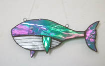 Irridescent stained glass whale